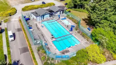HOA community swimming pool nearby.
