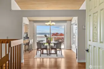 As you step inside, you're immediately greeted by breathtaking views, rich hardwood floors, and warm cedar-lined ceilings—setting the tone for this truly remarkable home.