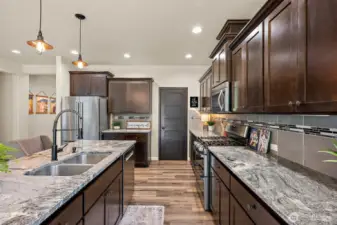 open concept living downstairs with two oversized, massive sliding doors