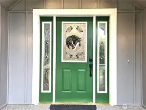 Beautiful custom stained glass window in door.