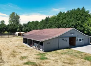 Horse barn with stalls and shop.