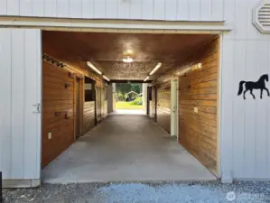 Enter barn with horse stalls ready for your horses.