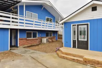 Back of house showing lower entrance and studio rental