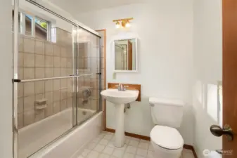spacious main floor bathroom off the main floor bedroom