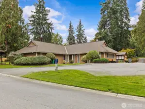 A clubhouse with a large parking lot is just one of the amenities.