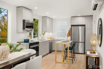 Stainless steel appliances, quartz countertops, & shaker cabinets are all standard options