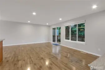 Open Living Room with Slider to Upper Deck