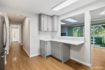 Cute little bar area looking out towards dining/living room.