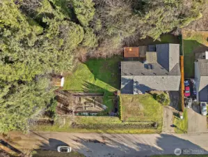 This shows the property with the included tax parcel.  There is a great garden area with fruit trees.  The backyard is also fully fenced.