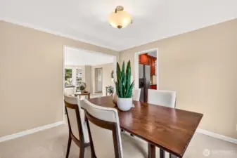 From the dining room, you can see how easily the home connects between living and kitchen areas, making hosting feel natural and effortless. The layout keeps everything close, without sacrificing defined spaces.