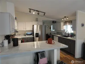 Kitchen w/new countertops and ranch sink!