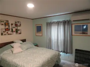 2nd spacious bedroom with full length closet and updated LED lighting and mini-ductless head