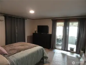 Large primary bedroom with access to bonus room.