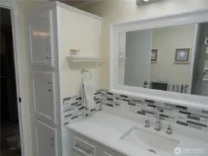 A lot of storage in the bathroom as well!  Large mirror!