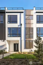 Private street runs along west side of site with guest entrance to 413