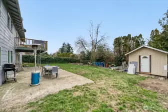 Large backyard with oversize shed