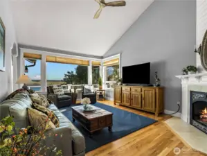 The large living room has vaulted ceilings and a gas fire place....and of course; a view.