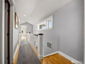 The Hallway/cat walk separate the primary suite from the guest room.