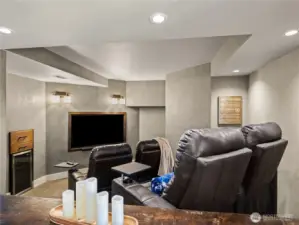 You have a small wine cooler at your disposal  in the movie room.