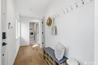 A view from the entry looking towards the bedrooms and laundry room.