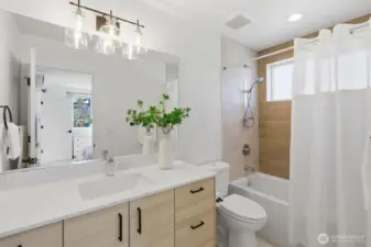 The Primary bath offers a large vanity, modern hardware and nice craftsmanship.