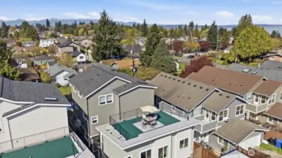 A photo capturing Olympic Mountain Views towards Golden Gardens Park.