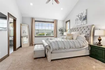 Relaxing, sunny & inviting owner's suite w/vaulted ceilings & tons of windows!