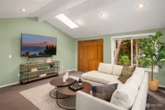 Voluminous Gathering Space with Vaulted Ceiling and South-facing Skylights