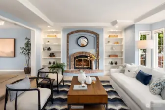 Living Room with Wood-burning Fireplace and Bay Window