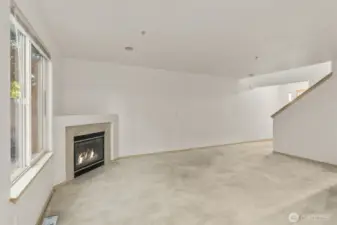 Open concept design connects living room, dining room and kitchen.
