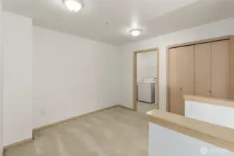 Spacious landing area can flex as a work space. Large laundry room adjacent to all rooms for convenience.