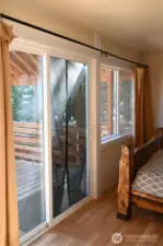 slider door to deck from bedroom