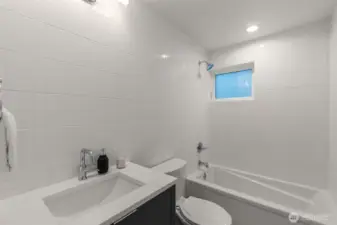 Spacious bathroom offering endless possibilities for your personal touch.