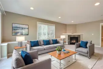 Lower rec/bonus room with fireplace and patio doors leading to your lower patio. Larger window and such a nice, larger space. ***Virtually Staged***