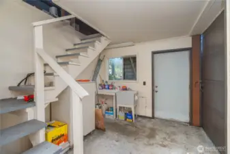 shops utility room, loft, 1/2 bath, office, and 3 bays.