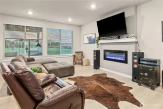 Relax in you spacious open living area with electric fireplace