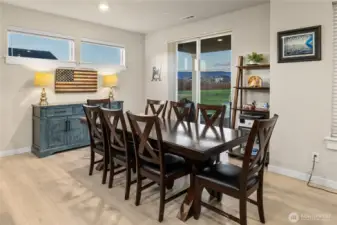 Dining space and sliding door to your backyard oasis