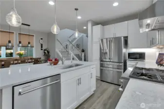 Upgraded Monogram stainless steel suite of appliances.