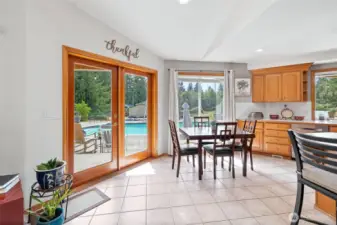 Big doors from the kitchen out to covered patio area. Perfect for BBQ's and entertaining.