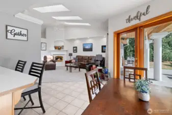 View from the kitchen to eating areas and living room.