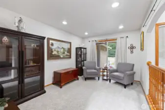 This room is a bonus room. Could be a formal dining room or family room.