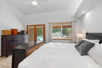 Primary suite has tall ceilings and great lighting options as well.