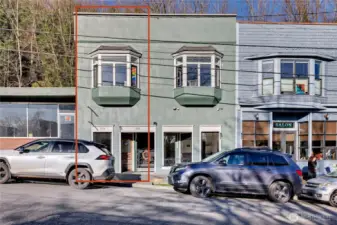 Left side of the building is two tax units, commercial up and residential down, and can be sold separately from the right side of the building.