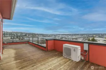 Rooftop deck with sweeping views of the Olympic Mountains and Ship Canal