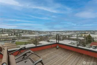 Rooftop deck with sweeping views of the Olympic Mountains and Ship Canal