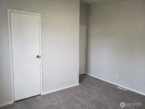 Another Picture of the Third Bedroom Showing Newer Trim, and Carpet Showing Closet.