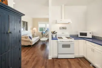 Kitchen looking into living room