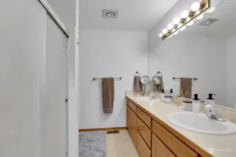 Primary bathroom w/double sinks, large shower.