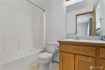 Primary bedroom ensuite full bathroom.