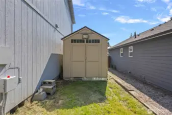 There are two great sheds, both with lights and outlets. They are back to back, one facing towards the front and the other facing towards the rear.